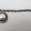 Thumbnail: Vintage 1950s Signed Napier Silvertone Round Charm Bracelet
