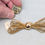 Thumbnail: Vintage Signed Napier Goldtone Wire Bow Brooch