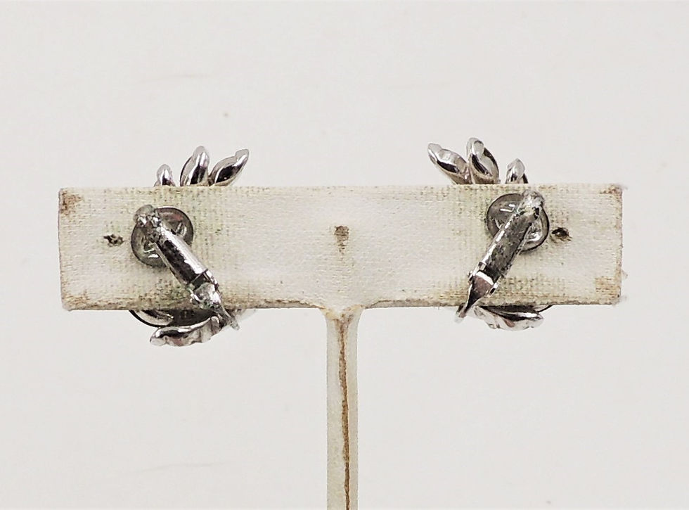 Thumbnail: Vintage Boucher Rhodium Plated Rhinestone Clip Earrings, c1961