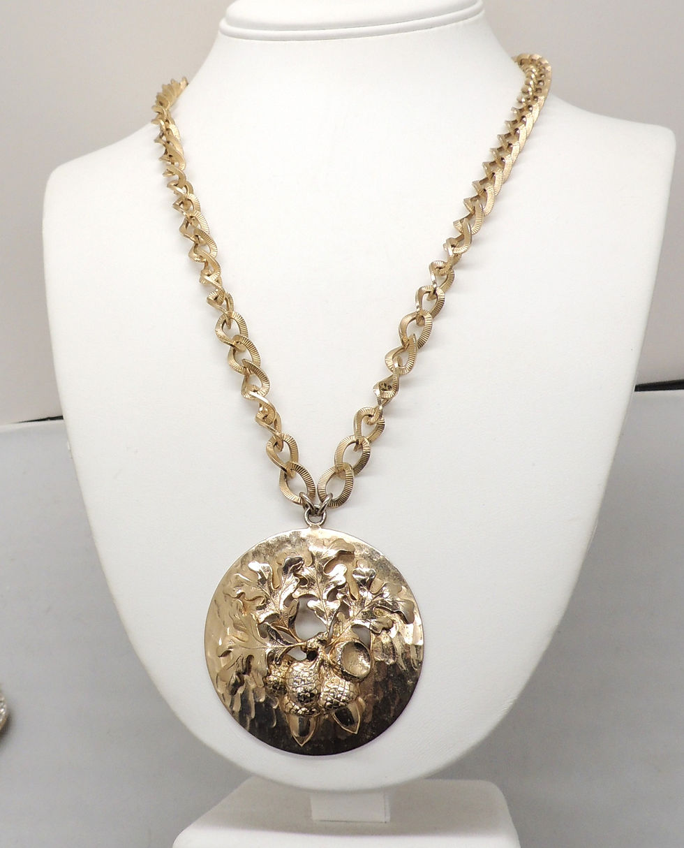Thumbnail: Vintage 1970s Signed Napier Goldtone Round Acorns Pendant Necklace