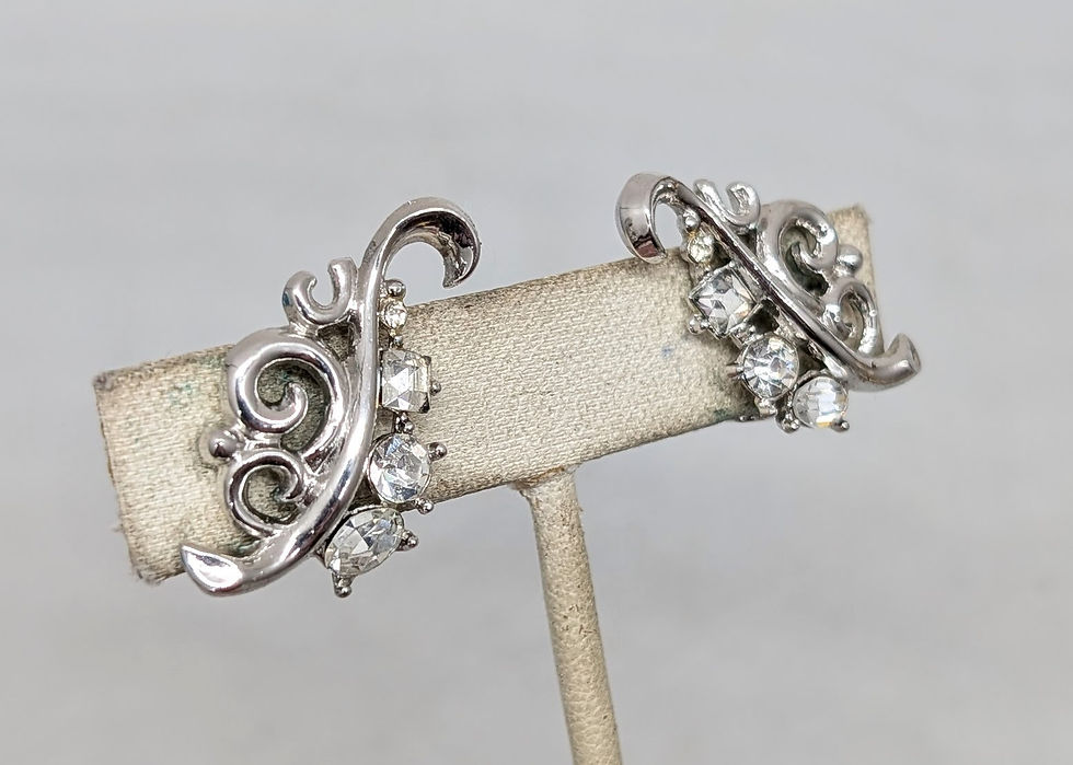 Thumbnail: Vintage Signed Crown Trifari Rhodium Plated Clear Rhinestone Clip Earrings, 1950