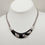 Thumbnail: Vintage Signed Monet Modernist Black Enamel Pave Rhinestone Collar Necklace