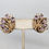 Thumbnail: Vintage Signed Crown Trifari Goldtone Faux-Amethyst Clip Earrings