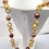 Thumbnail: Vintage Signed Napier Hammered Goldtone Links With Red & Orange Beads Necklace,