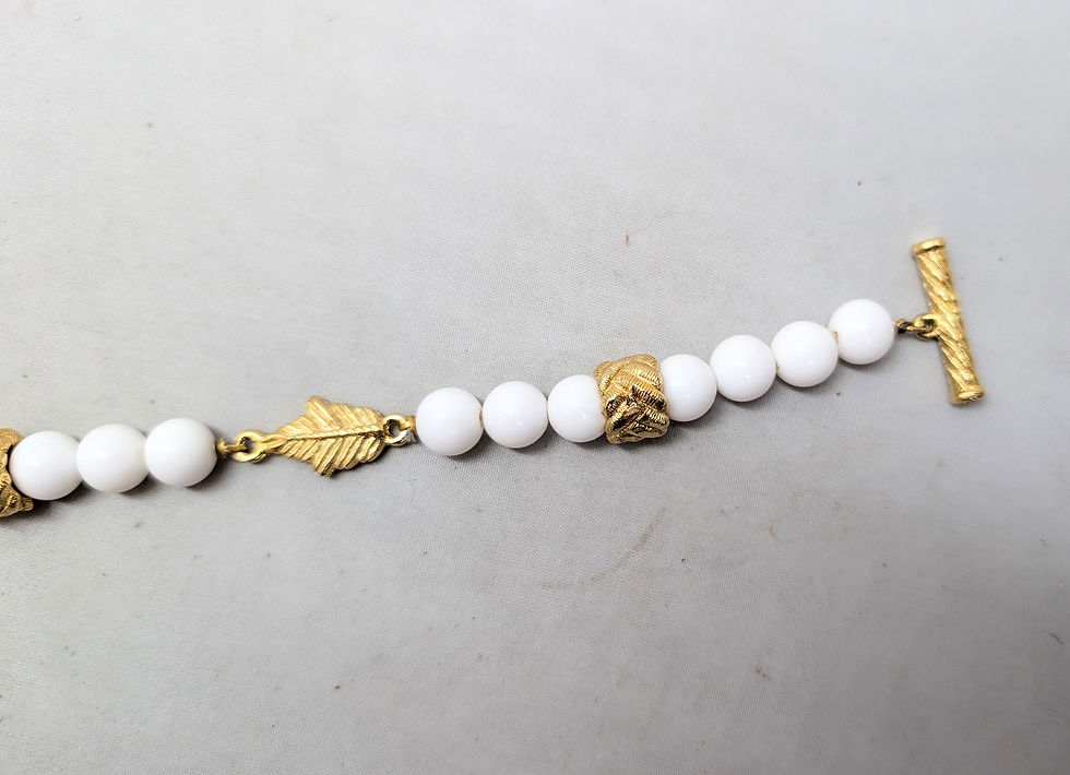 Thumbnail: Vintage 1980s Signed Givenchy Goldtone & White Resin Leaf Toggle Bracelet