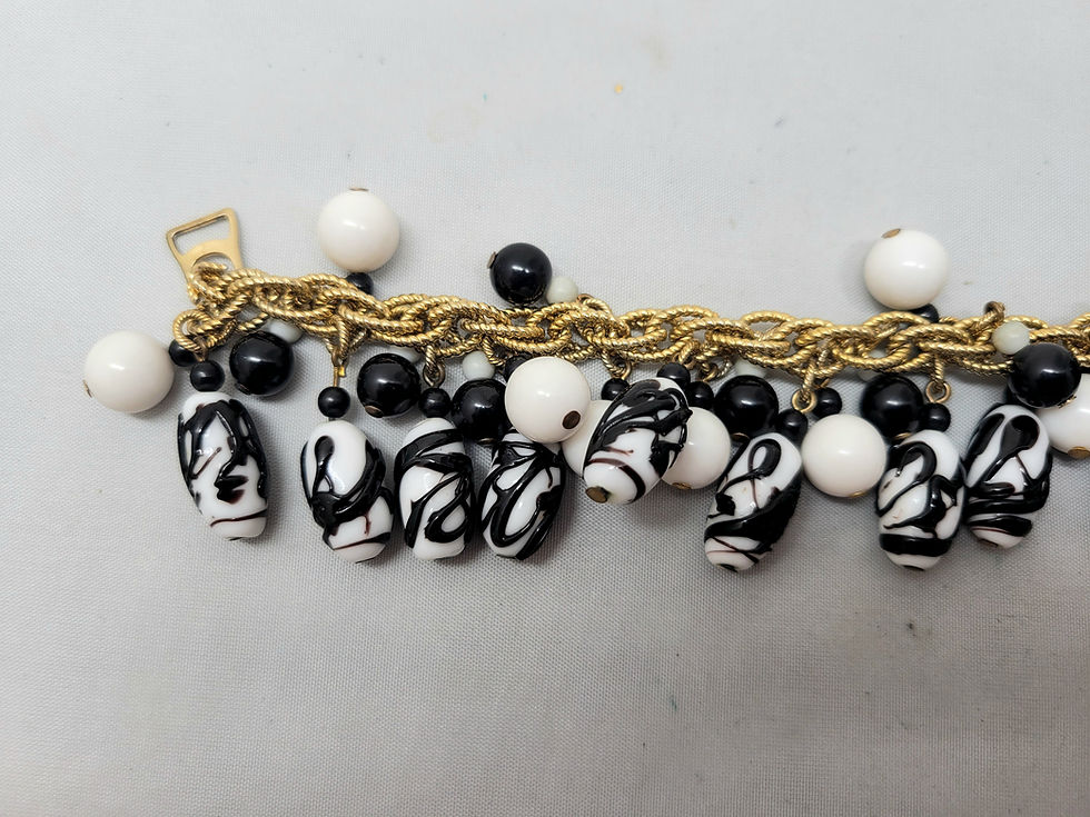 Thumbnail: Vintage Signed Napier Book Piece Goldtone Zebra Bead Charm Bracelet, 1967