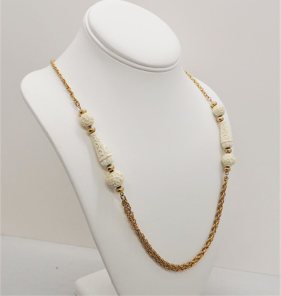Thumbnail: Vintage 1970s Signed Crown Trifari Carved Faux-Ivory Sautoir Necklace