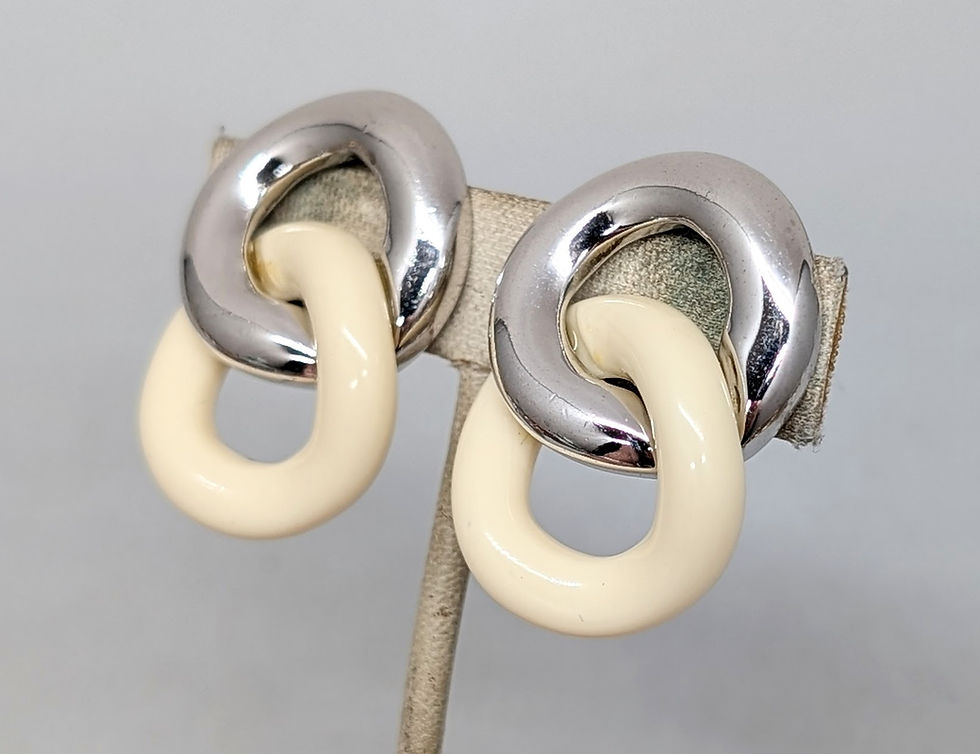 Thumbnail: Vintage 1980s Signed Givenchy Rhodium Plated Ivory Enamel Figure 8 Clip Earrings