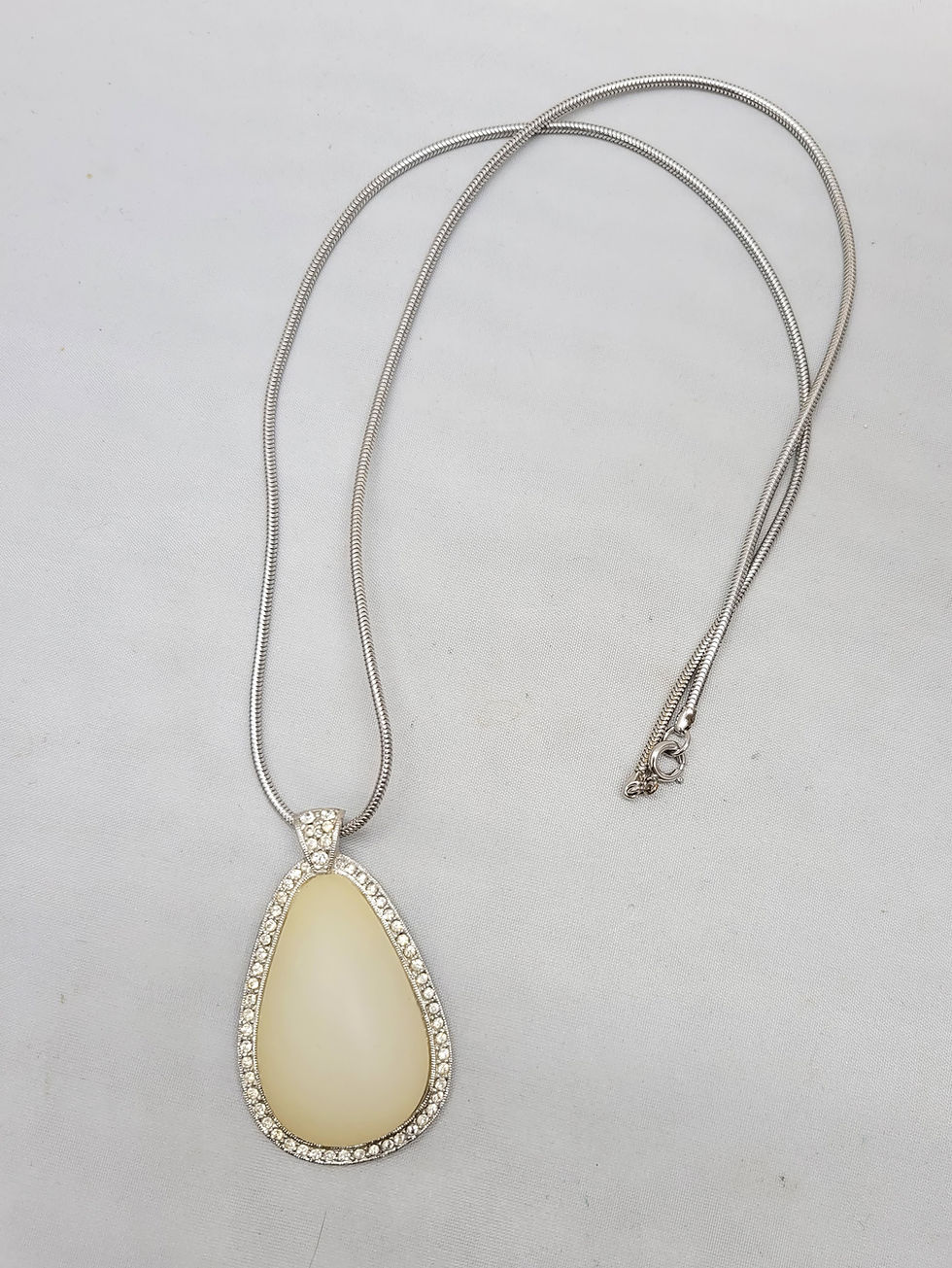 Thumbnail: Vintage Signed Hattie Carnegie Resin & Clear Rhinestone Pendant Necklace