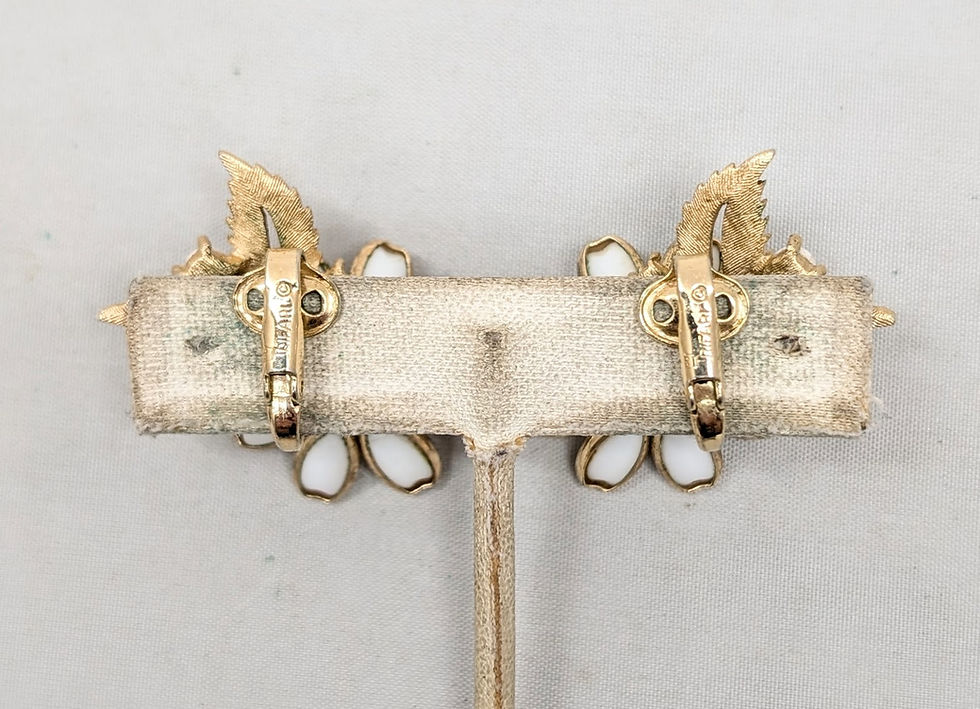 Thumbnail: Vintage 1950s Signed Crown Trifari Goldtone White Flower Clip Earrings