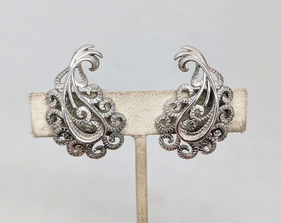 Thumbnail: Vintage 1960s Signed Monet Rhodium Plated Filigree Clip Earrings