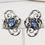Thumbnail: Vintage 1950s Napier Silvertone Faux-Aquamarine Clip Earrings