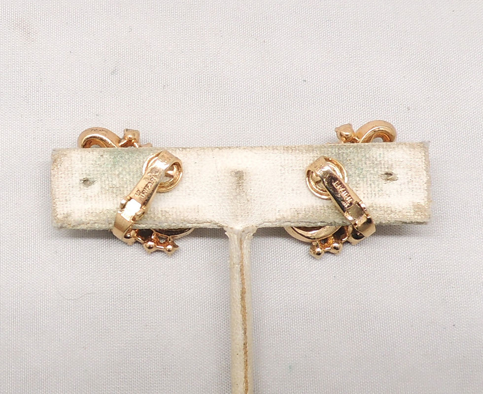 Thumbnail: Vintage Signed Crown Trifari Goldtone Faux-Amethyst Clip Earrings, 1953 Ad Piece