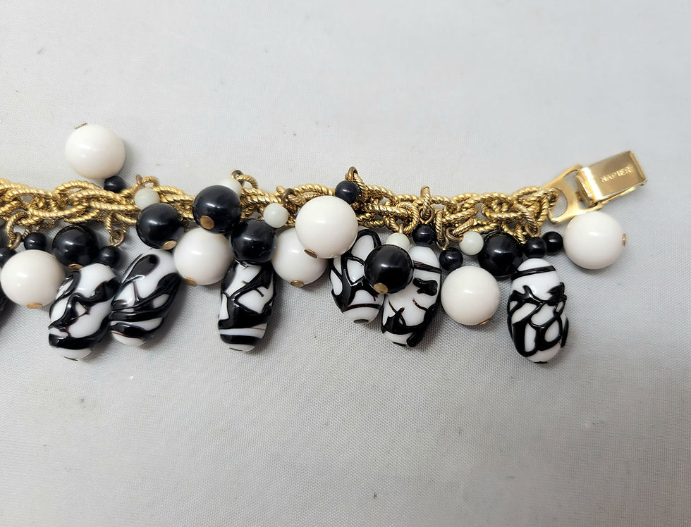 Thumbnail: Vintage Signed Napier Book Piece Goldtone Zebra Bead Charm Bracelet, 1967