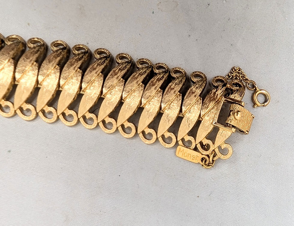 Thumbnail: Vintage 1960s Signed Monet Goldtone Articulated Bracelet