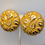 Thumbnail: Vintage Signed Escada Round Goldtone & Orange Enamel Clip Earrings