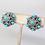 Thumbnail: Vintage 1960s Signed Crown Trifari Cabochon Faux-Turquoise Clip Earrings