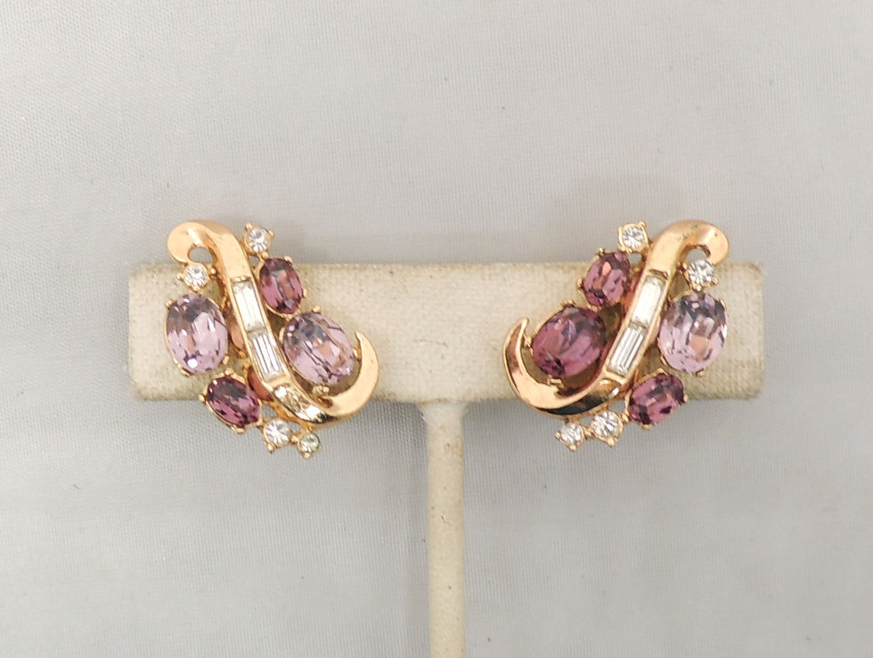Thumbnail: Vintage Signed Crown Trifari Goldtone Faux-Amethyst Clip Earrings, 1953 Ad Piece