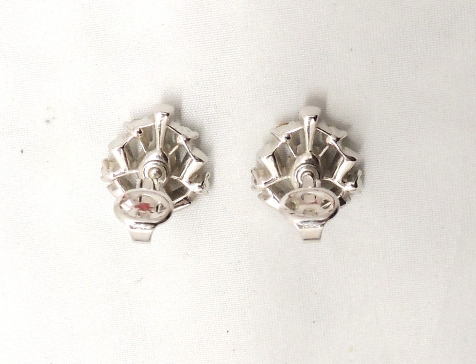 Thumbnail: Vintage 1950s Crown Trifari Rhodium Plated Faux-Sapphire Clip Earrings
