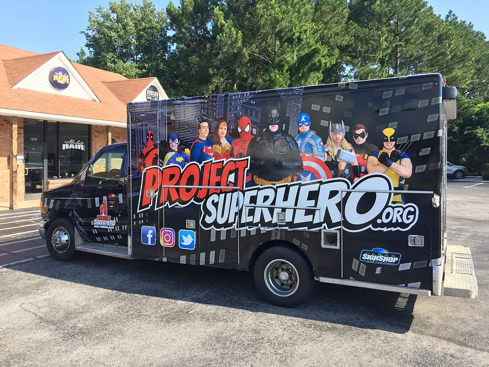 Vibrant full vinyl wrap applied to a large box truck for a Irving, TX logistics company, creating a high-visibility, professional brand presence on North Texas highways.