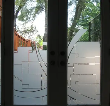 Modern frosted window vinyl with a sharp chevron privacy pattern for a Plano corporate glass wall, providing a high-end "etched glass" look with clean geometric lines for a Metroplex boardroom.