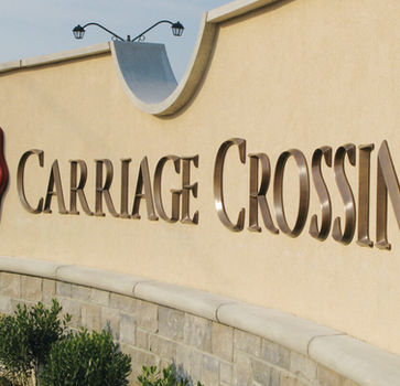 Architectural cast metal aluminum letters for a Dallas-Fort Worth (DFW) professional building, featuring a deep prismatic profile and brushed satin finish for a permanent, high-prestige brand identity in North Texas.