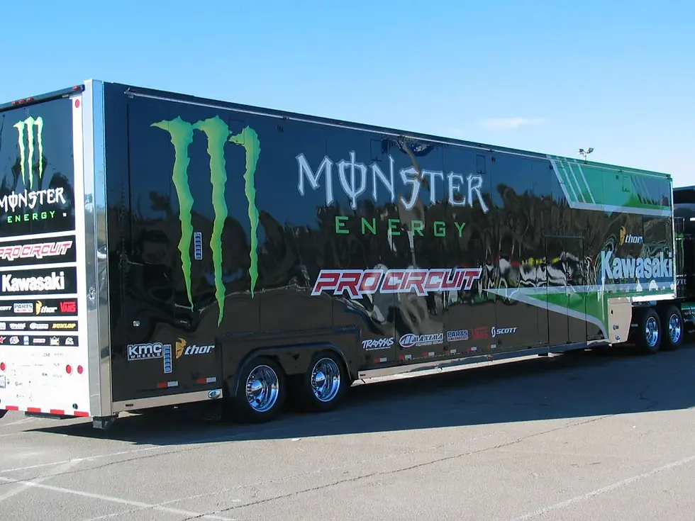 Custom vinyl wrap on a dual-axle cargo trailer for a Fort Worth, TX construction firm, showcasing durable, weather-resistant vinyl graphics designed for high-impact branding at job sites throughout Tarrant County.