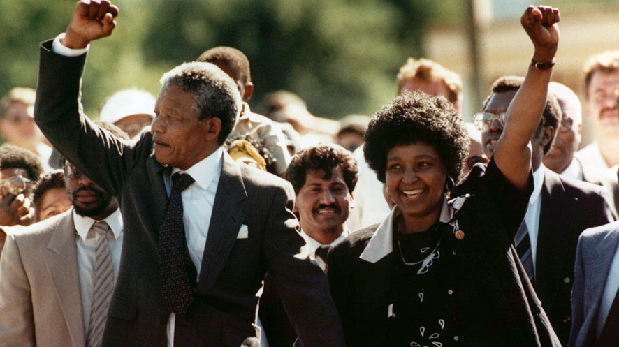 Nelson Mandela walking out of prison.