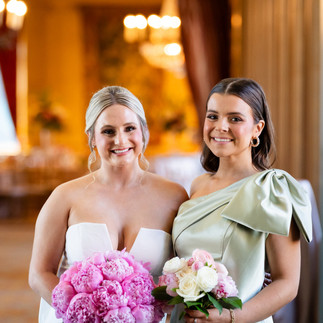 bride and bridesmaids with pink bouquets