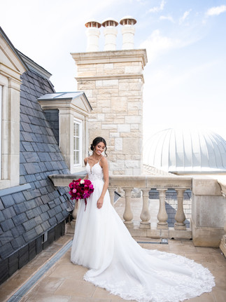 Bridal portrait with elegant gown and bridal bouquet by Justine's Flowers Fort Worth, TX