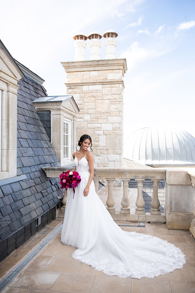 Bridal portrait with elegant gown and bridal bouquet by Justine's Flowers Fort Worth, TX