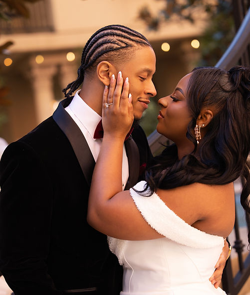 Elegant Black couple embracing during their wedding day, reflecting a joyful and beautifully planned luxury wedding experience in Houston