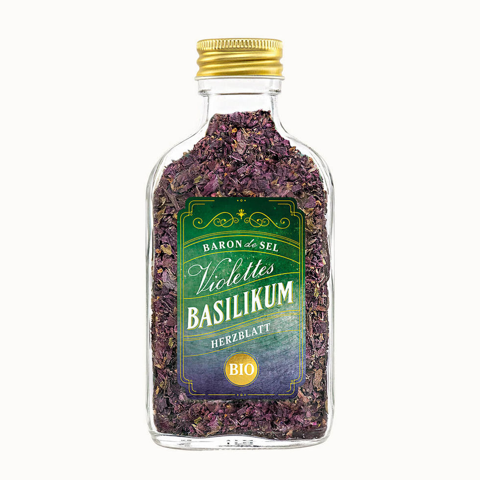 Violettes Basilikum getrocknet im Glas Flachmann