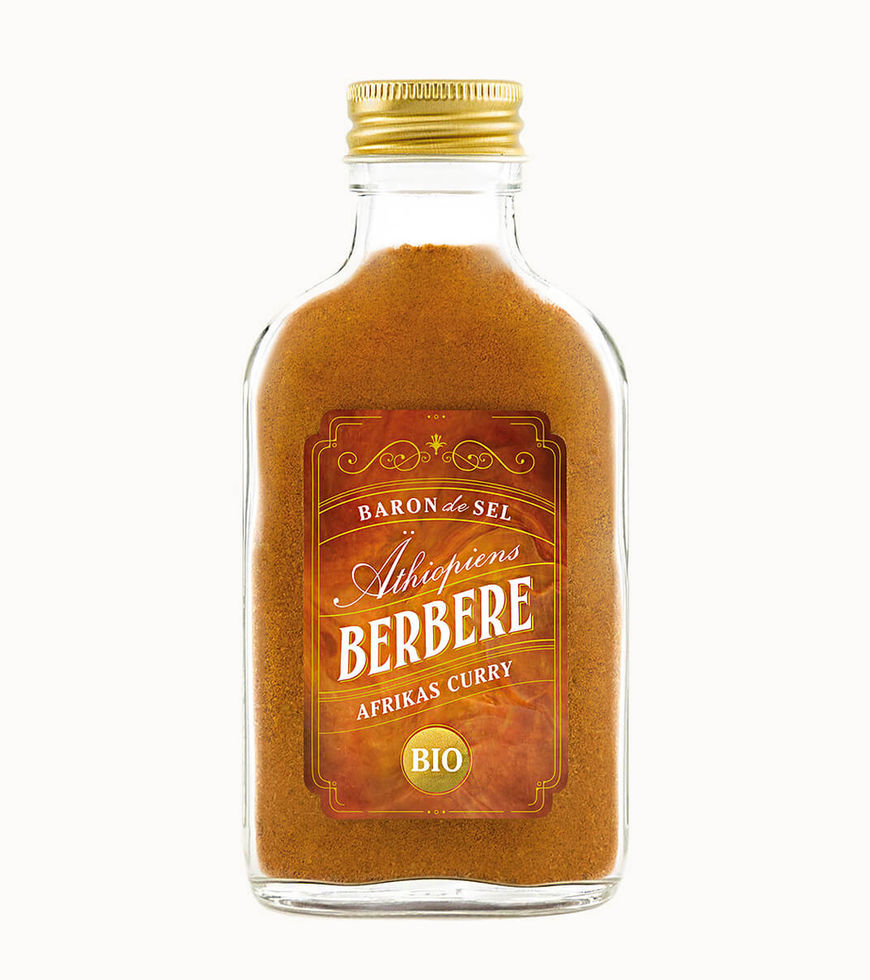 Afrikanisches Gewürz im Glas Flachmann