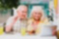 elderly-couple-having-video-call-on-tabl