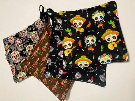 We have Day of the Dead potholders available for this holiday weekend! $8 each