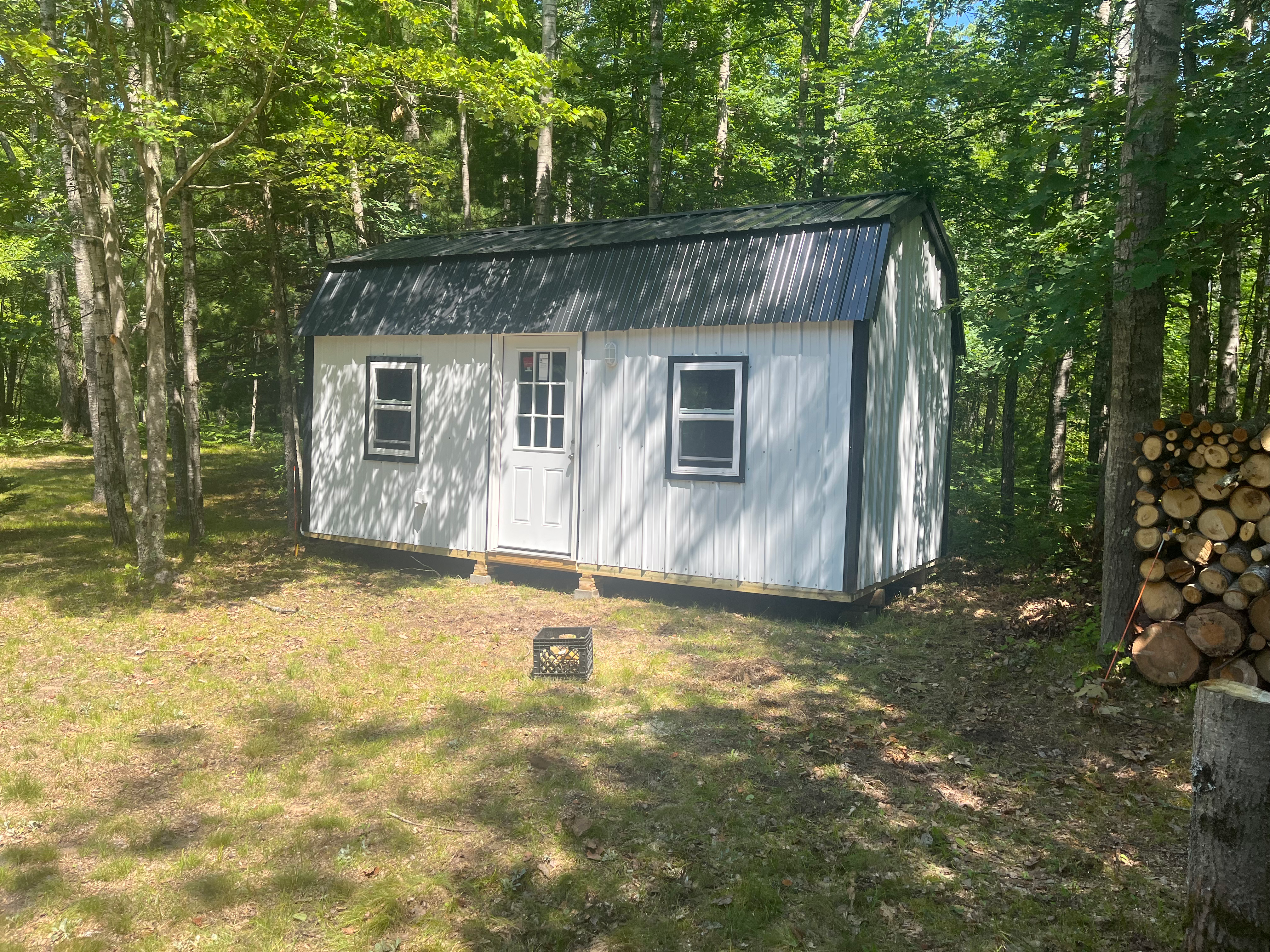 10'x20' double lofted 3 windows, man door, insulation, electric package