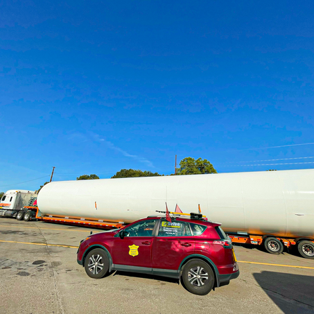 When Is a Pilot Car Legally Required for Oversize Loads in the United States and Canada?