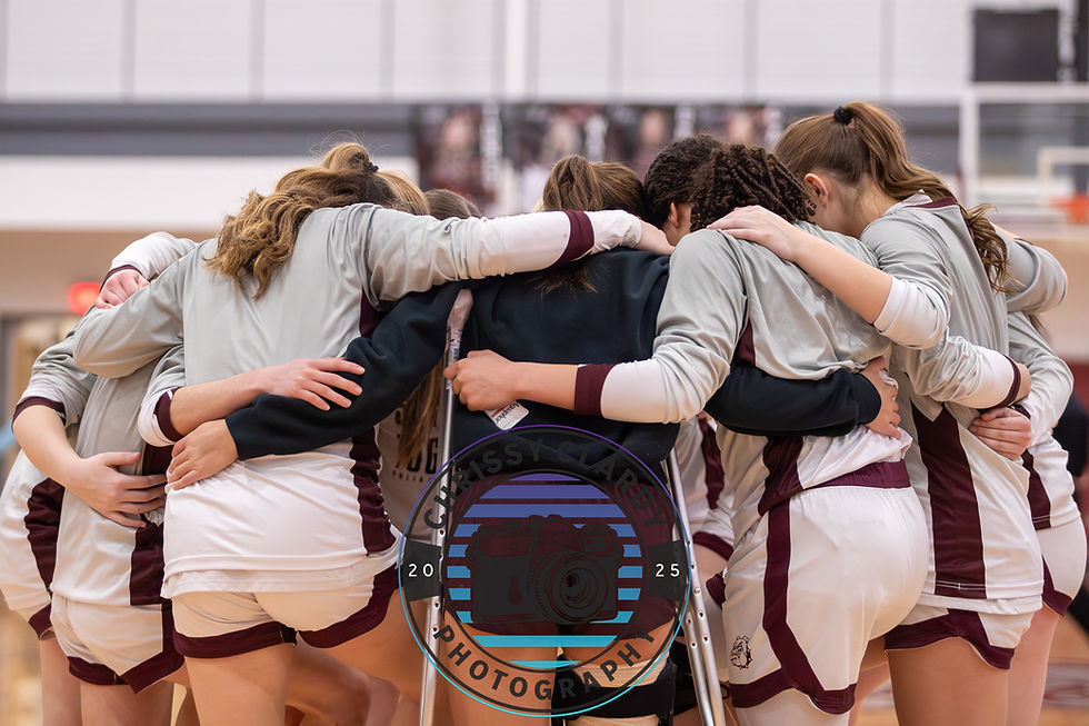 Lady Bulldogs Huddle. (Photo courtesy of Chrissy Clardy Photography.)