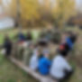 Cadets sitting around a fire pit