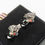 Thumbnail: Silver dog cufflinks Paul Smith signature stripe detail on a black box.