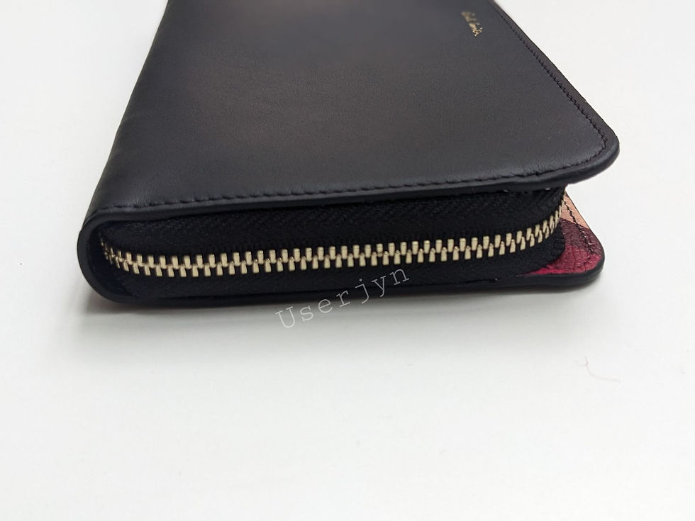 Thumbnail: Black Paul Smith wallet with a zipper and the Paul Smith logo.