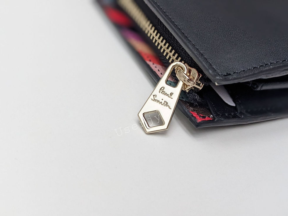 Thumbnail: Paul Smith wallet zipper detail. 