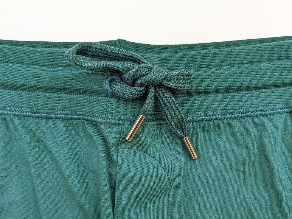 Thumbnail: Green fabric with tied drawstring