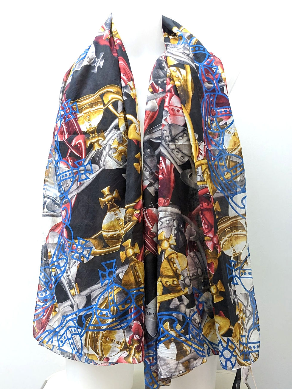Colorful Vivienne Westwood scarf with iconic orb design, navy, red, and gold accents.