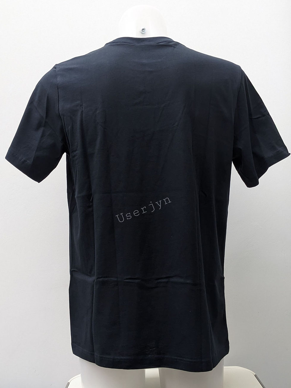 Thumbnail: A dark blue t-shirt with visible text Userjyn, displayed on white background.