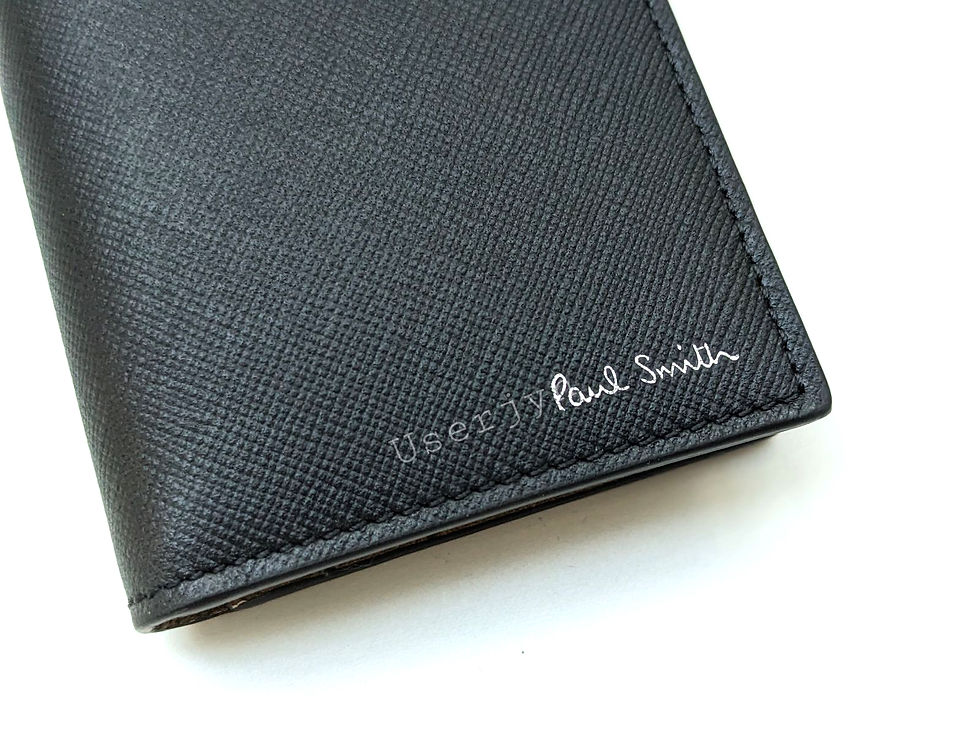 Thumbnail: Black 'Paul Smith' logo wallet detail, elegant design and brand signature.