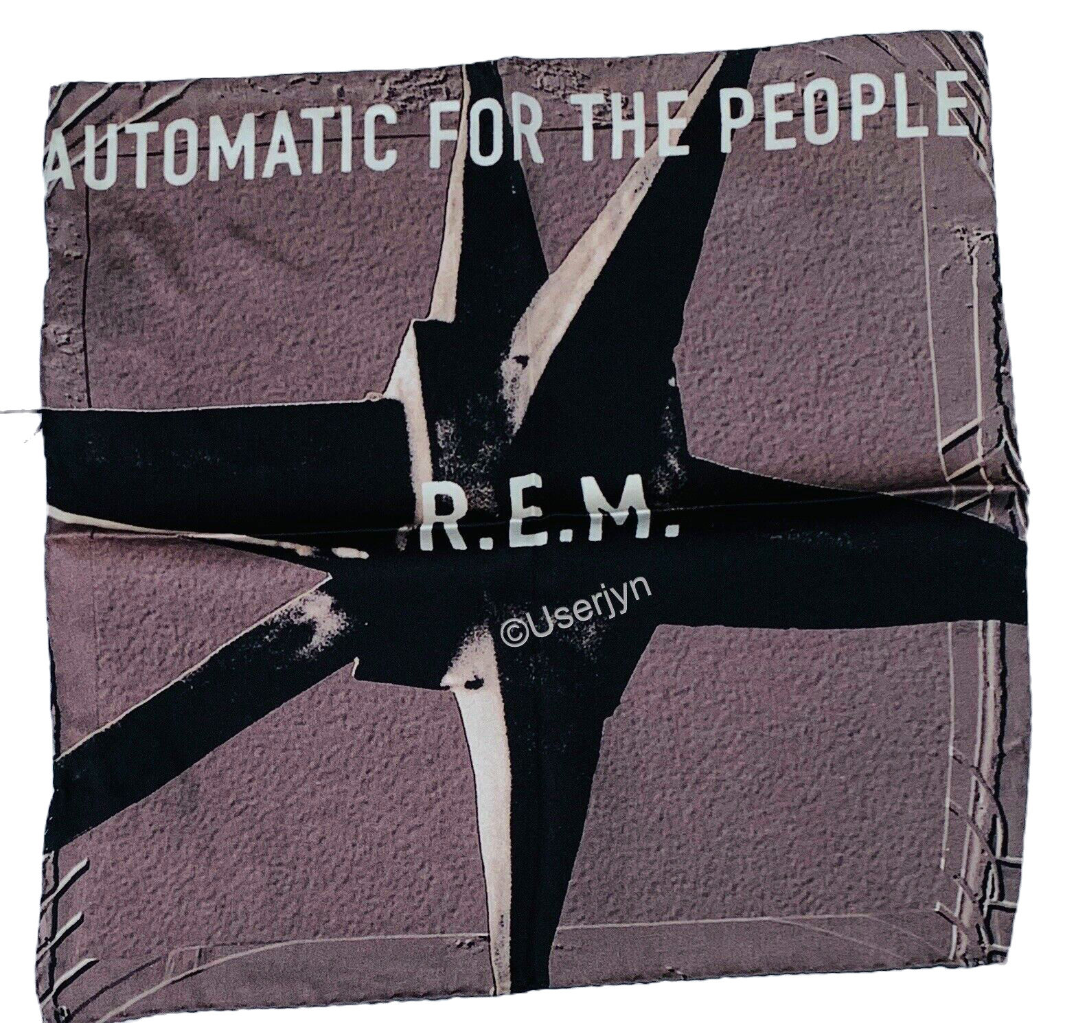 R.E.M. Automatic For The People album cover design on textured background.