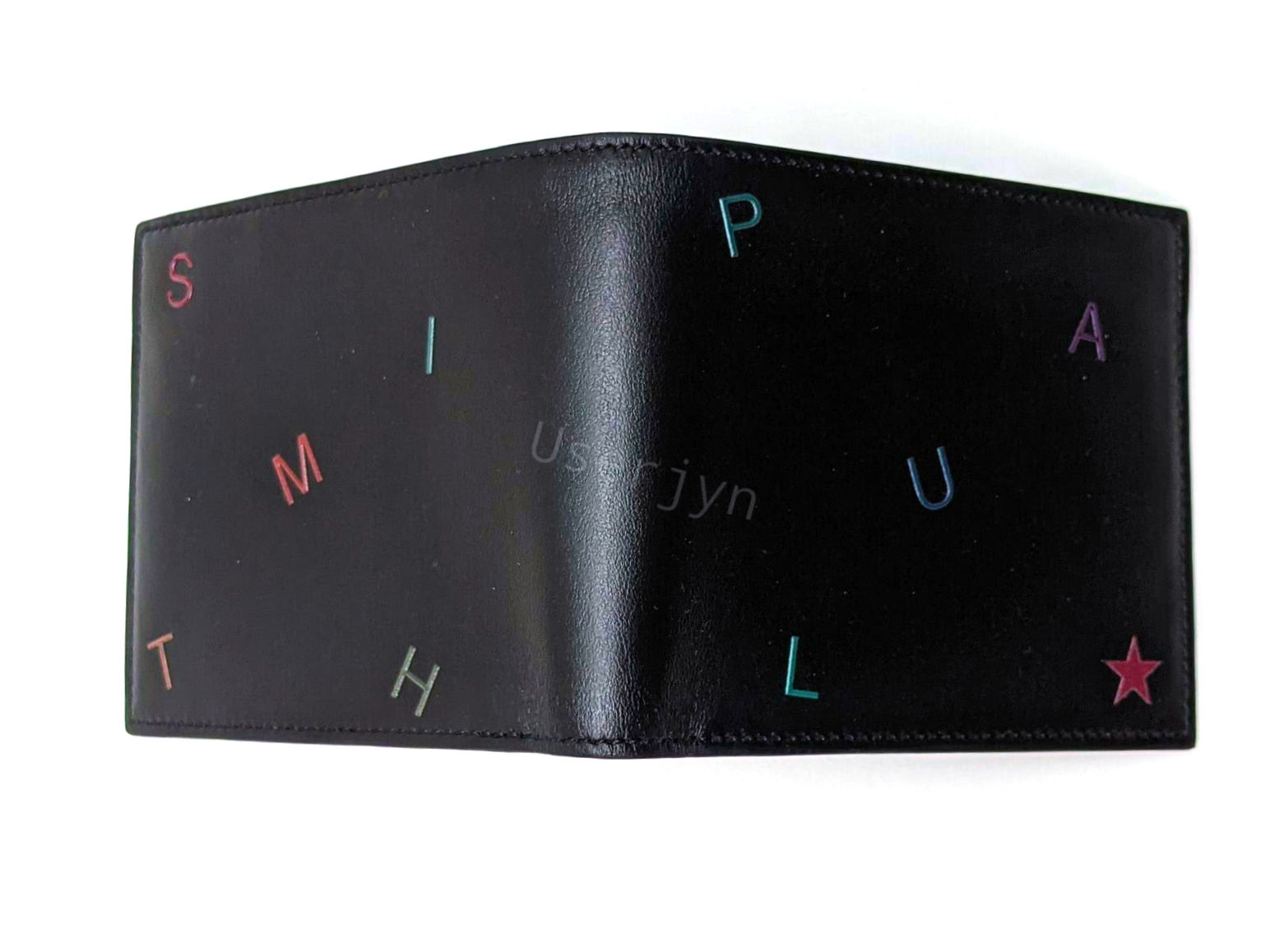 Black Paul Smith wallet with colorful letters