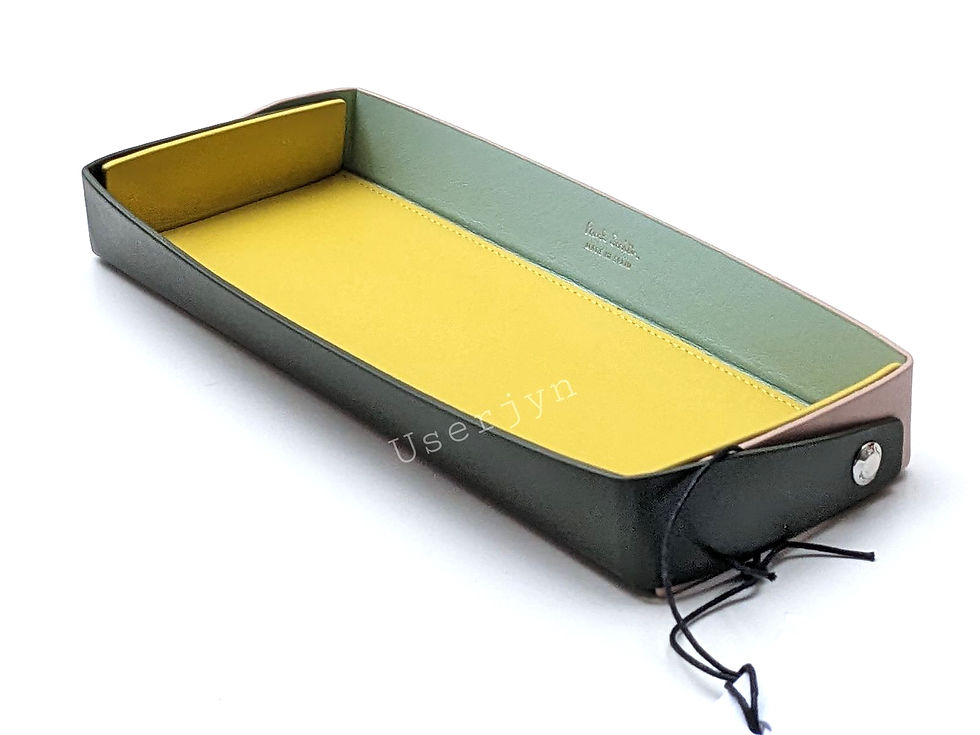 Thumbnail: Leather Tray with yellow and green interior. Decorative item, elegant design.